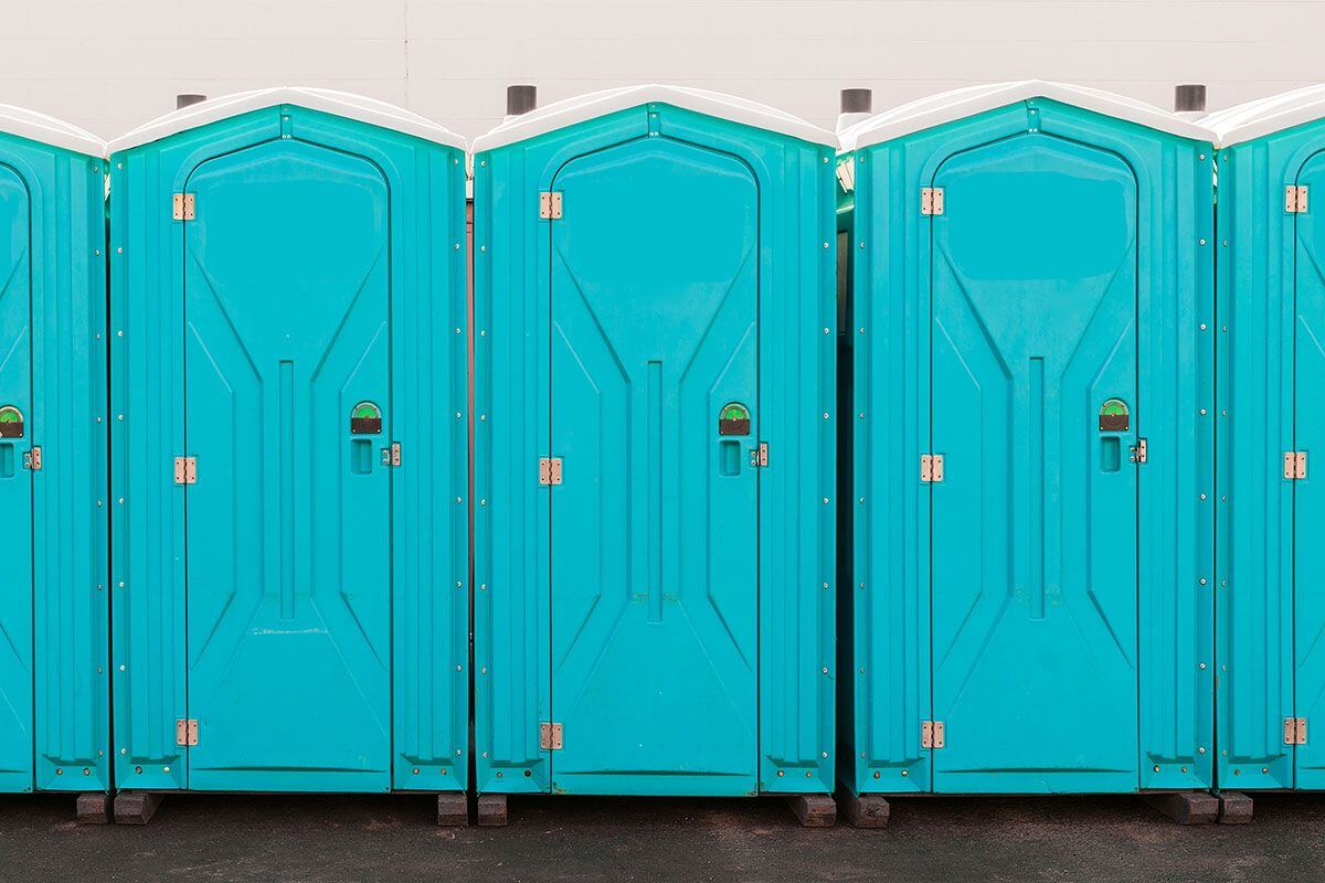 Industrial portable restroom units at a plant in Denton, Texas
